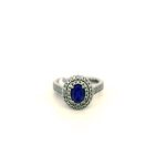 18CT WHITE GOLD TANZANITE AND DIAMOND FANCY RING