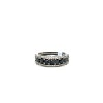 18CT WHITE GOLD BLACK AND WHITE DIAMOND BAND